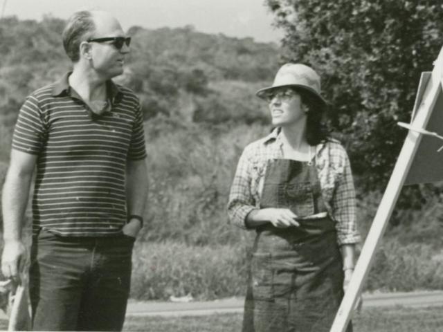 Pitcher advising Nancy Hanover-Reyes (CCS Art '88) during a landscape painting class, mid 1980's.